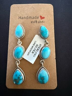 Handmade lone mountain turquoise triple stone dangle earrings. Solid 925